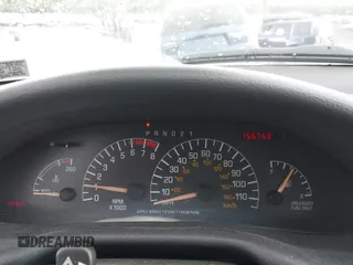 1999 Pontiac Sunfire SE z VIN 1G2JB5248X7528290, wystawiony jako IAAI lot #42252324 z przebiegiem 156 758 mil mil oraz . Historia ofert i sprzedaży dostępna na DreamBid. Obrazek 7.