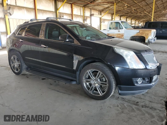 2012 Cadillac SRX Premium Collection z VIN 3GYFNFE30CS599863, wystawiony jako Copart lot #61249995 z przebiegiem 144 740 mil mil oraz Czysty tytuł • Clean title. Historia ofert i sprzedaży dostępna na DreamBid. Obrazek 4.