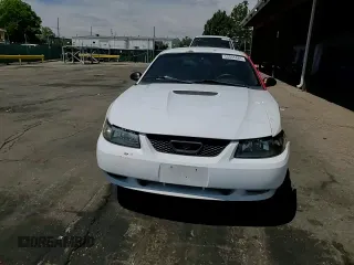 2000 Ford Mustang z VIN 1FAFP4045YF302687, wystawiony jako Copart lot #58044485 z przebiegiem 191 961 mil mil oraz Szkoda całkowita • Salvage title. Historia ofert i sprzedaży dostępna na DreamBid. Obrazek 13.