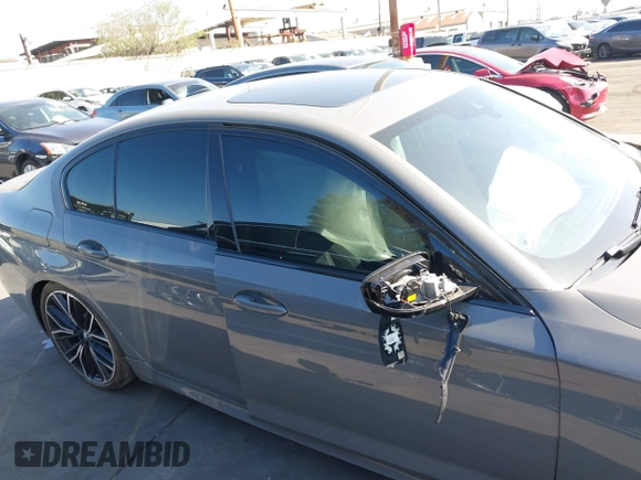 2022 BMW 5 Series M550i xDrive with VIN WBA13BK02NCJ61943, listed as a IAAI auction lot 41607980 with Not provided miles and . Bid and sale history available at DreamBid. Image 14.