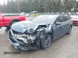 2021 Toyota Avalon Hybrid XSE z VIN 4T1EA1AB9MU007905, wystawiony jako IAAI lot #40501204 z przebiegiem 86 869 mil mil oraz . Historia ofert i sprzedaży dostępna na DreamBid. Obrazek 2.