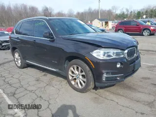 2014 BMW X5 xDrive35i with VIN 5UXKR0C57E0H20944, listed as a IAAI auction lot 42011451 with 208,205 mi miles. Bid and sale history available at carsss.com. Image 1.