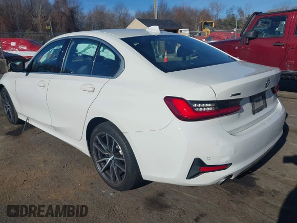2019 BMW 3 Series 330i xDrive with VIN WBA5R7C54KAJ87250, listed as a IAAI auction lot 40857709 with 81,796 mi miles. Bid and sale history available at carsss.com. Image 3.