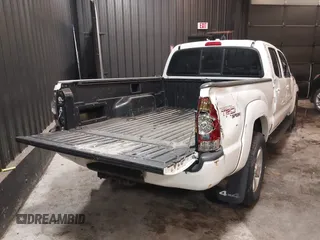 2010 Toyota Tacoma with VIN 5TEMU4FN1AZ738584, listed as a IAAI auction lot 42288815 with 184,679 mi miles and . Bid and sale history available at DreamBid. Image 4.