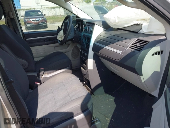 2010 Dodge Grand Caravan SE with VIN 2D4RN4DE0AR125435, listed as a IAAI auction lot 40681039 with 193,424 mi miles and . Bid and sale history available at DreamBid. Image 5.