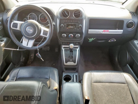 2017 Jeep Compass High Altitude with VIN 1C4NJCEB4HD198794, listed as a Copart auction lot 56976745 with 183,196 mi miles and Salvage title. Bid and sale history available at DreamBid. Image 8.
