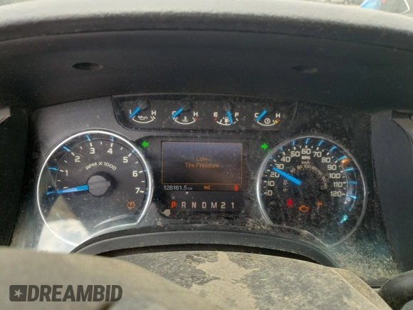 2013 Ford F-150 XL with VIN 1FTFW1EF8DFA21791, listed as a Copart auction lot 61963215 with 128,161 mi miles and Salvage title. Bid and sale history available at DreamBid. Image 9.