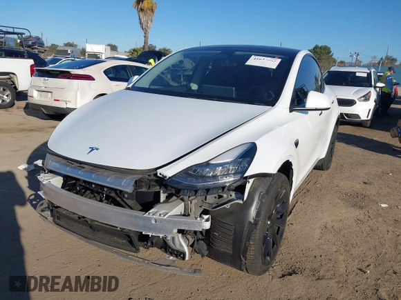 2023 Tesla Model Y Long Range with VIN 7SAYGDEE1PA128818, listed as a IAAI auction lot 41622062 with 19,089 mi miles. Bid and sale history available at carsss.com. Image 20.