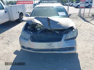 2007 Toyota Avalon XL with VIN 4T1BK36B57U241189, listed as a IAAI auction lot 42130640 with 144,735 mi miles. Bid and sale history available at carsss.com. Image 6.