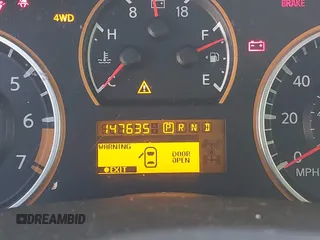 2012 Nissan Titan SV with VIN 1N6BA0EJ0CN309933, listed as a IAAI auction lot 41472091 with 147,635 mi miles. Bid and sale history available at carsss.com. Image 7.