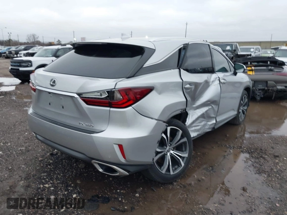 2019 Lexus RX with VIN 2T2ZZMCA8KC147017, listed as a IAAI auction lot 41557384 with 47,153 mi miles. Bid and sale history available at carsss.com. Image 4.