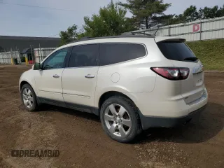 2013 Chevrolet Traverse LTZ z VIN 1GNKVLKD6DJ107802, wystawiony jako Copart lot #58519305 z przebiegiem 157 046 mil mil oraz Czysty tytuł • Clean title. Historia ofert i sprzedaży dostępna na DreamBid. Obrazek 2.