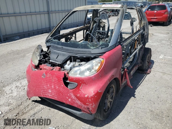 2009 Smart fortwo Passion z VIN WMEEK31X99K211682, wystawiony jako Copart lot #54110385 z przebiegiem Nie podano mil oraz Szkoda całkowita • Salvage title. Historia ofert i sprzedaży dostępna na DreamBid. Obrazek 1.