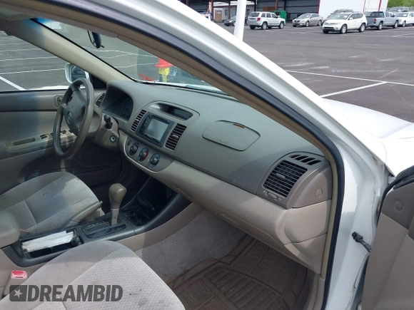2004 Toyota Camry LE with VIN 4T1BE32K64U277496, listed as a IAAI auction lot 42130199 with 250,972 mi miles. Bid and sale history available at carsss.com. Image 5.