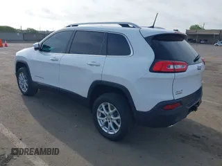 2016 Jeep Cherokee Latitude with VIN 1C4PJMCS1GW185442, listed as a IAAI auction lot 42033699 with 123,306 mi miles. Bid and sale history available at carsss.com. Image 3.
