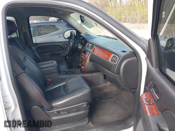 2013 Chevrolet Suburban LT with VIN 1GNSKJE79DR328718, listed as a IAAI auction lot 42005926 with 168,610 mi miles and . Bid and sale history available at DreamBid. Image 5.