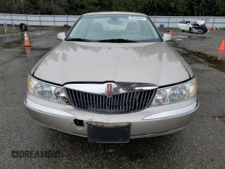 2002 Lincoln Continental with VIN 1LNHM97V22Y693053, listed as a Copart auction lot 85540044 with 179,465 mi miles and Salvage Title. Bid and sale history available at carsss.com. Image 5.