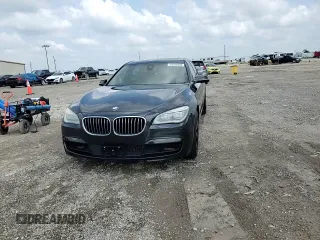 2015 BMW 7 Series 750Li z VIN WBAYE8C51FD782155, wystawiony jako Copart lot #54796505 z przebiegiem 112 772 mil mil oraz Szkoda całkowita • Salvage title. Historia ofert i sprzedaży dostępna na DreamBid. Obrazek 13.