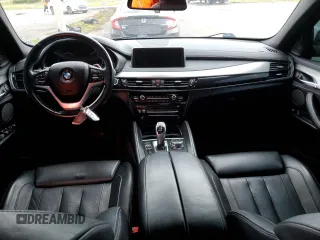 2018 BMW X6 xDrive50i with VIN 5UXKU6C5XJ0W39056, listed as a Copart auction lot 75116634 with 90,043 mi miles and Salvage Title. Bid and sale history available at carsss.com. Image 8.