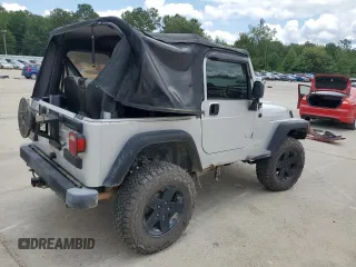2005 Jeep Wrangler X with VIN 1J4FA39S55P353789, listed as a Copart auction lot 62469015 with 143,817 mi miles and Salvage title. Bid and sale history available at DreamBid. Image 3.