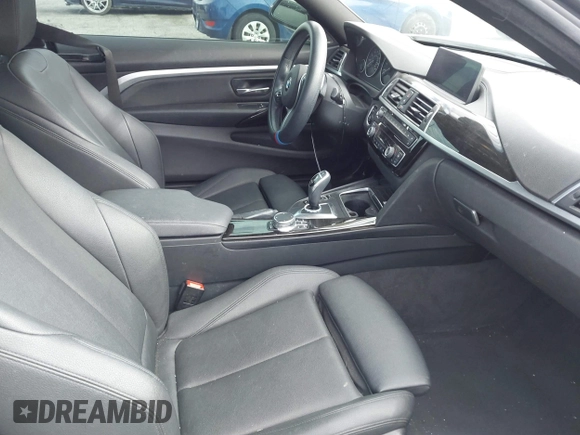 2019 BMW 4 Series 430i with VIN WBA4W3C5XKAF93081, listed as a IAAI auction lot 41689477 with 87,936 mi miles and . Bid and sale history available at DreamBid. Image 5.