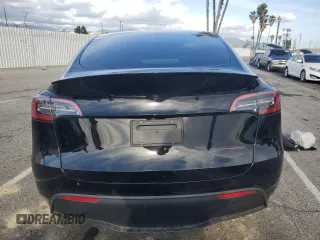 2022 Tesla Model Y Performance with VIN 7SAYGDEF9NF455508, listed as a Copart auction lot 51517205 with Not provided miles and Salvage title. Bid and sale history available at DreamBid. Image 6.