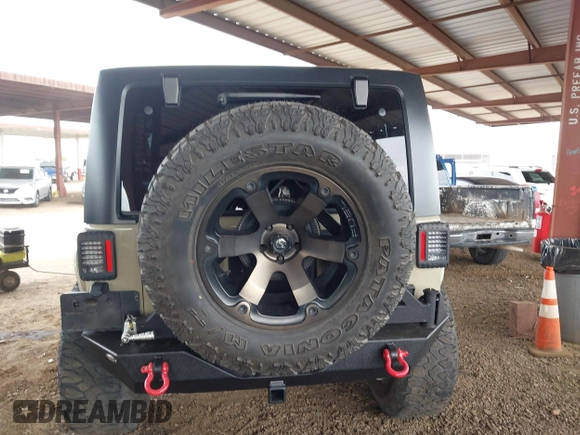 2017 Jeep Wrangler Unlimited Rubicon with VIN 1C4BJWFG7HL663203, listed as a IAAI auction lot 42391999 with 63,430 mi miles and . Bid and sale history available at DreamBid. Image 17.