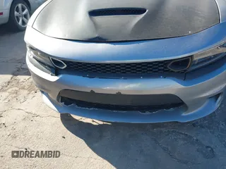 2015 Dodge Charger SXT with VIN 2C3CDXHG8FH884080, listed as a IAAI auction lot 42230385 with 151,948 mi miles and . Bid and sale history available at DreamBid. Image 6.