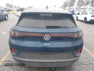 2023 Volkswagen ID.4 Pro z VIN 1V2CMPE88PC028158, wystawiony jako IAAI lot #41538391 z przebiegiem 7159 mil mil oraz . Historia ofert i sprzedaży dostępna na DreamBid. Obrazek 17.