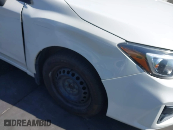 2018 Subaru Impreza with VIN 4S3GTAA6XJ3729301, listed as a IAAI auction lot 41643511 with 91,953 mi miles and . Bid and sale history available at DreamBid. Image 6.