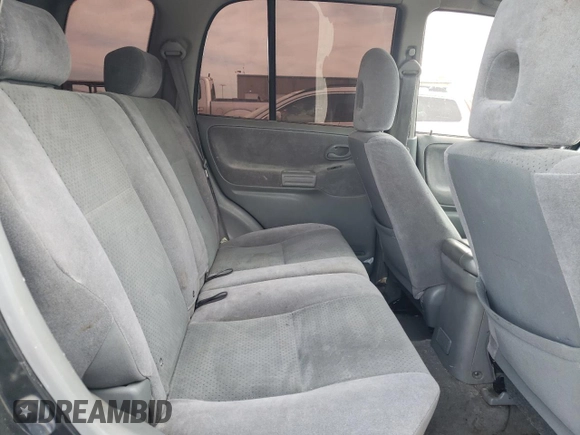 2003 Suzuki Grand Vitara z VIN JS3TE62V834101506, wystawiony jako Copart lot #47094765 z przebiegiem 240 778 mil mil oraz Szkoda całkowita • Salvage title. Historia ofert i sprzedaży dostępna na DreamBid. Obrazek 11.