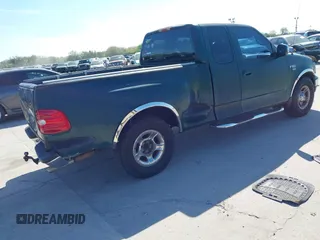 1999 Ford F-150 XL with VIN 2FTRX07W1XCA67223, listed as a IAAI auction lot 41661743 with 1 mi miles. Bid and sale history available at carsss.com. Image 4.