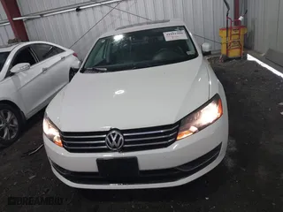 2013 Volkswagen Passat SE w/Sunroof with VIN 1VWBH7A35DC111003, listed as a IAAI auction lot 41991990 with 142,103 mi miles. Bid and sale history available at carsss.com. Image 12.