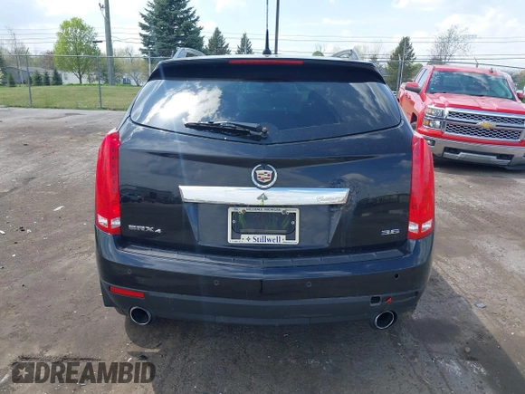 2014 Cadillac SRX Luxury Collection z VIN 3GYFNEE32ES659705, wystawiony jako IAAI lot #42148269 z przebiegiem 140 560 mil mil oraz . Historia ofert i sprzedaży dostępna na DreamBid. Obrazek 16.
