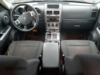 2011 Dodge Nitro SXT z VIN 1D4PT5GK1BW544326, wystawiony jako Copart lot #85863564 z przebiegiem 259 017 mil mil oraz Szkoda całkowita • Salvage title. Historia ofert i sprzedaży dostępna na DreamBid. Obrazek 8.