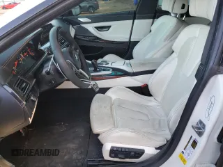 2016 BMW M6 z VIN WBS6E9C51GG437202, wystawiony jako Copart lot #71389434 z przebiegiem 80 673 mil mil oraz Szkoda całkowita • Salvage title. Historia ofert i sprzedaży dostępna na DreamBid. Obrazek 7.