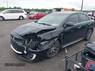 2017 Mitsubishi Lancer ES z VIN JA32V2FW6HU001870, wystawiony jako IAAI lot #42333550 z przebiegiem 75 938 mil mil oraz . Historia ofert i sprzedaży dostępna na DreamBid. Obrazek 2.
