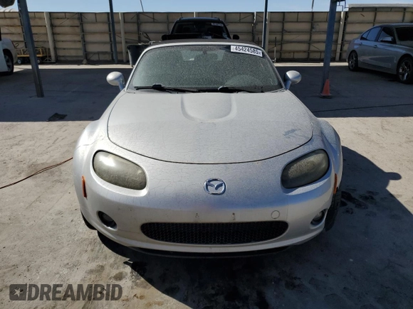 2007 Mazda MX-5 Miata Sport with VIN JM1NC25F470128936, listed as a Copart auction lot 45424585 with 123,910 mi miles and Salvage title. Bid and sale history available at DreamBid. Image 5.