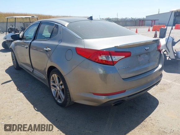 2013 Kia Optima SX with VIN 5XXGR4A61DG178390, listed as a IAAI auction lot 42212824 with 128,055 mi miles and . Bid and sale history available at DreamBid. Image 3.