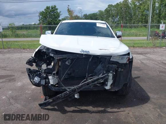 2014 Jeep Grand Cherokee Summit with VIN 1C4RJFJT6EC281114, listed as a IAAI auction lot 42497582 with 128,181 mi miles and . Bid and sale history available at DreamBid. Image 12.
