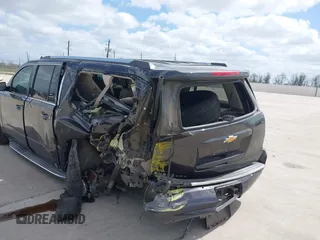 2015 Chevrolet Suburban LTZ with VIN 1GNSCKKC9FR500933, listed as a IAAI auction lot 41830980 with 169,217 mi miles and . Bid and sale history available at DreamBid. Image 6.