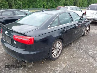 2013 Audi A6 Premium Plus with VIN WAUGFAFC4DN131779, listed as a IAAI auction lot 42373464 with 133,505 mi miles and . Bid and sale history available at DreamBid. Image 4.
