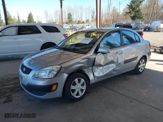 2006 Kia Rio with VIN KNADE123266114567, listed as a IAAI auction lot 41685941 with 107416 miles. Bid and sale history available at carsss.com. Image 17.