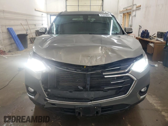 2018 Chevrolet Traverse LT z VIN 1GNEVHKW9JJ124245, wystawiony jako Copart lot #57029805 z przebiegiem 157 694 mil mil oraz Szkoda całkowita • Salvage title. Historia ofert i sprzedaży dostępna na DreamBid. Obrazek 5.