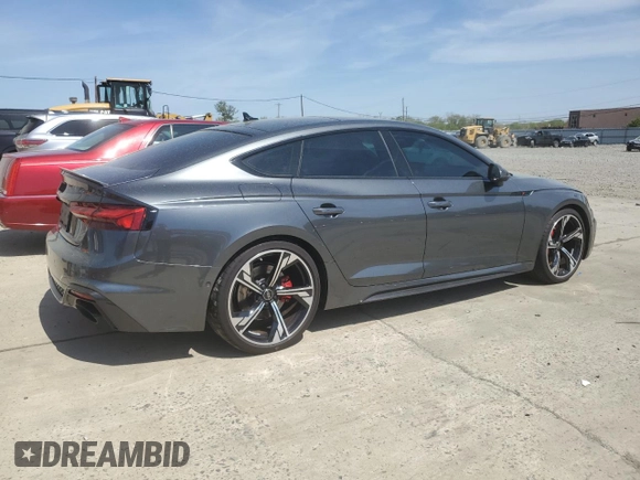 2023 Audi RS 5 Sportback z VIN WUAAWCF55PA902979, wystawiony jako Copart lot #54194715 z przebiegiem 9 576 mil mil oraz Szkoda całkowita • Salvage title. Historia ofert i sprzedaży dostępna na DreamBid. Obrazek 3.
