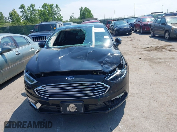 2017 Ford Fusion Titanium with VIN 3FA6P0K9XHR117300, listed as a IAAI auction lot 42731703 with 47,276 mi miles and . Bid and sale history available at DreamBid. Image 12.