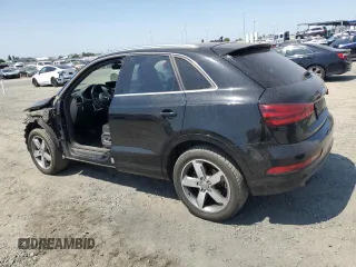 2015 Audi Q3 Premium Plus with VIN WA1EFCFS3FR013984, listed as a Copart auction lot 58785965 with 172,930 mi miles and Salvage title. Bid and sale history available at DreamBid. Image 2.
