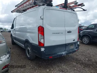 2021 Ford Transit Cargo z VIN 1FTYE1Y86MKA71783, wystawiony jako IAAI lot #42183454 z przebiegiem 53 405 mil mil oraz . Historia ofert i sprzedaży dostępna na DreamBid. Obrazek 3.
