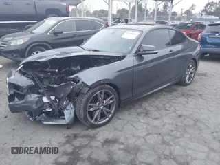2016 BMW 2 Series M235i with VIN WBA1J7C50GV360395, listed as a IAAI auction lot 41158426 with 81,208 mi miles. Bid and sale history available at carsss.com. Image 2.