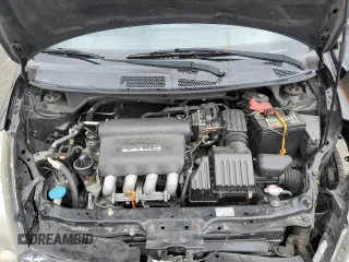 2007 Honda Fit z VIN JHMGD38457S012962, wystawiony jako Copart lot #55927755 z przebiegiem 172 153 mil mil oraz Szkoda całkowita • Salvage title. Historia ofert i sprzedaży dostępna na DreamBid. Obrazek 11.